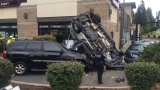 Suspected impaired driver crashes car upside down into Starbucks drive-thru