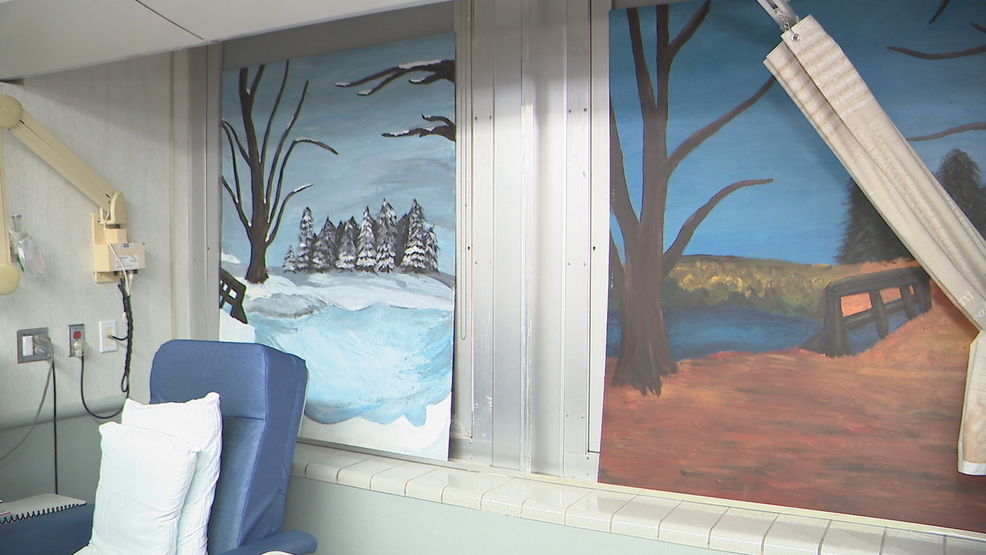 Students create artwork over boarded-up windows at RGH cancer institute
