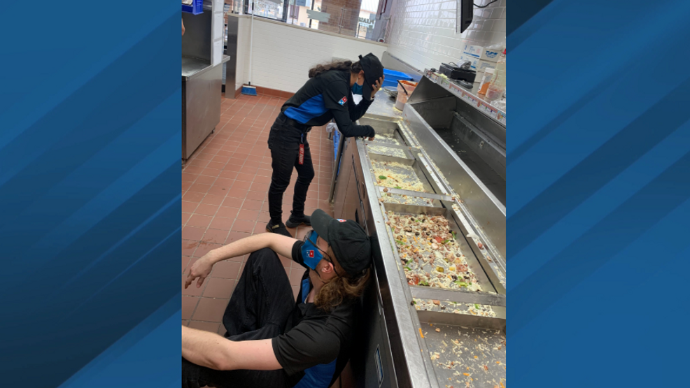 Picture of exhausted Domino's Pizza workers goes viral; others also work through storm KEYE
