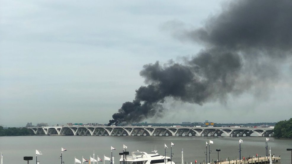 Cars on fire on Woodrow Wilson Bridge, Wednesday, June 20, 2018. (Courtesy @CameronJ) 