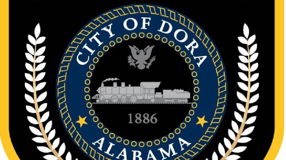 Dora Police Officers searching for man who sped through checkpoint WBMA