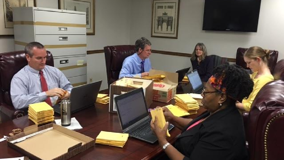 Auditors cataloging Hamilton County evidence files collecting dust for